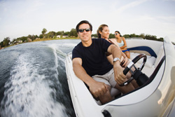 a man driving a boat