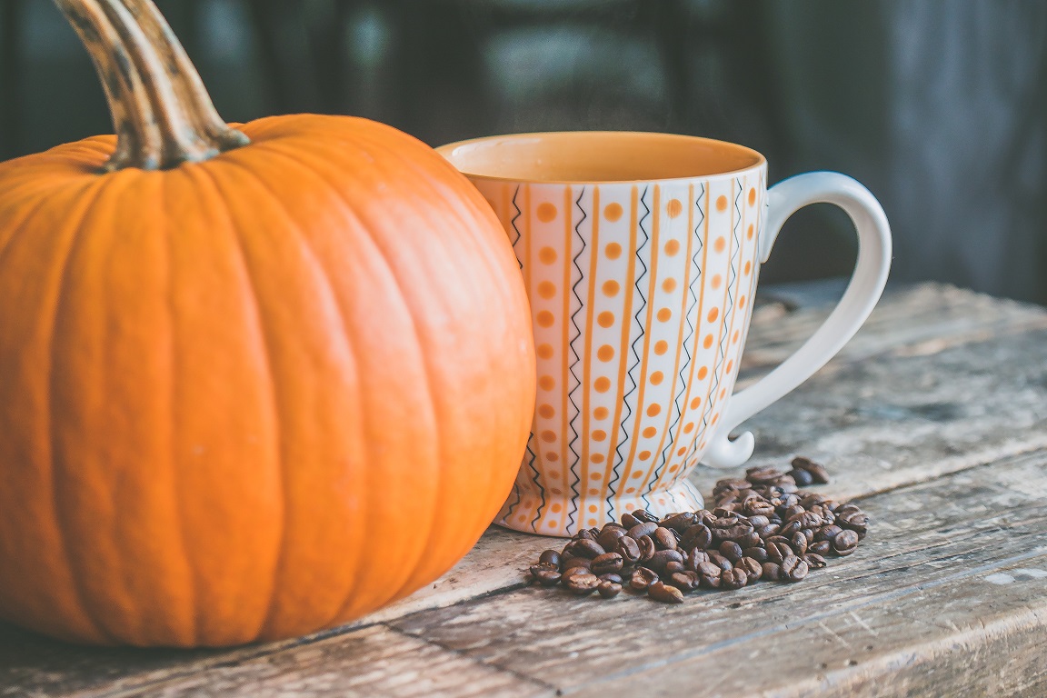 a close up of a coffee cup sitting on a table