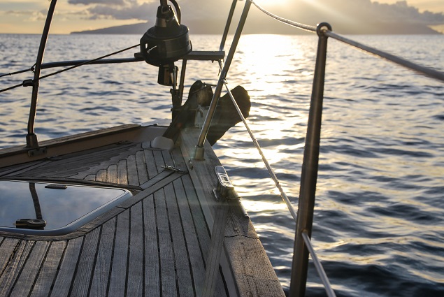 a wooden boat in a body of water