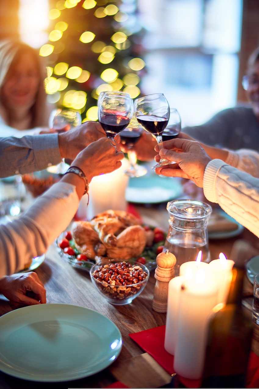 a dinner party table with cheers